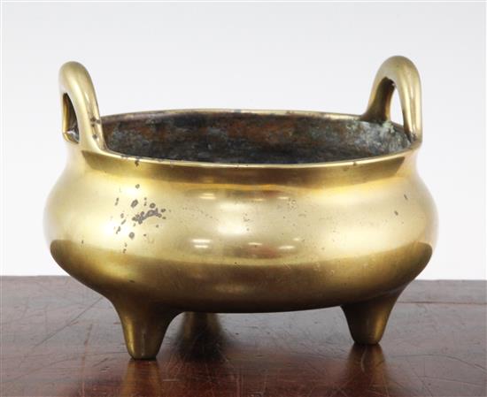 A large Chinese bronze tripod censer, Ding, Xuande six character mark, probably 18th / 19th century, diam. 20.5cm, weight 2030g.